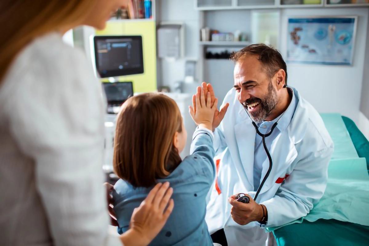 Image of a doctor interacting with a patient